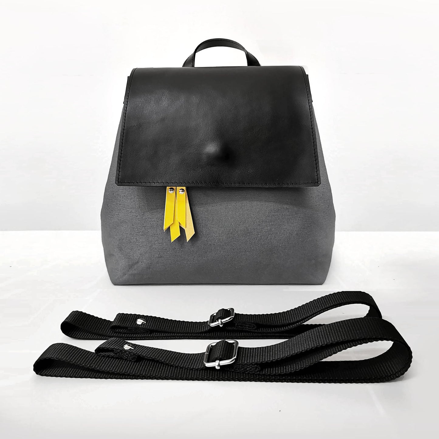 alain faux leather backpack Black leather and fabric backpack or convertible bag