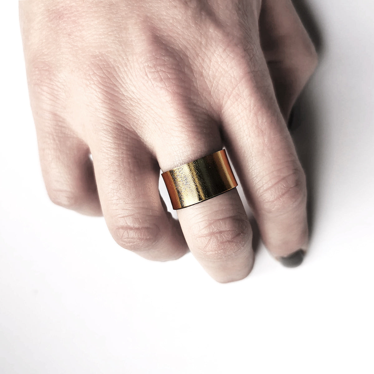 shiny gold leather ring by angela pinto
